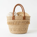 Handmade woven straw beach tote bag with leather handles